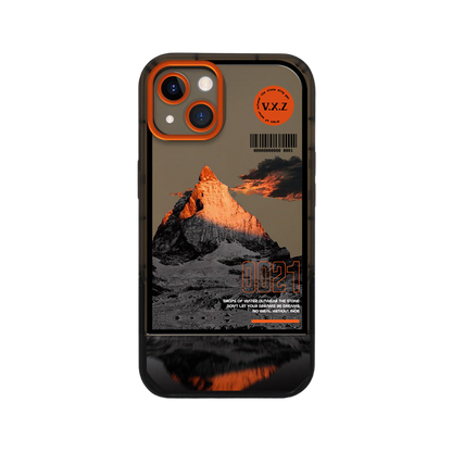 a phone case with a mountain in the background